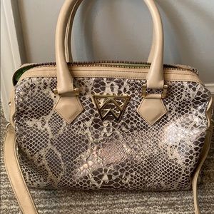 Kelly Wynne barrel crossbody bag